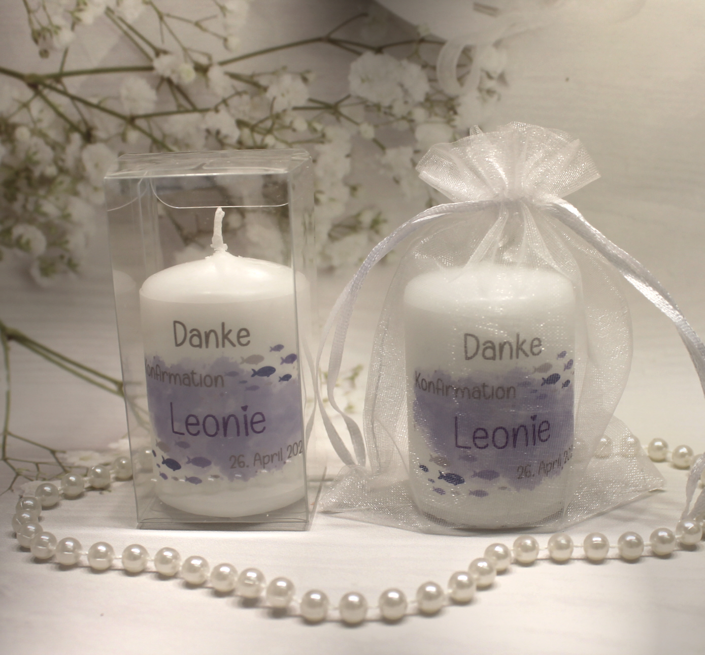 Gastgeschenk Kerze "Fisch lila" wahlweise im Organzasäckchen oder in der Geschenkschachtel Design K30